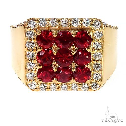 Yellow gold ring with a 3x3 red sapphire square surrounded by diamonds