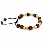 Adjustable men's bracelet with polished red tiger eye and textured gold beads on black cord.