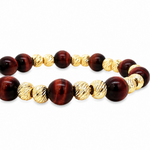 Adjustable men's bracelet with polished red tiger eye and textured gold beads on black cord.