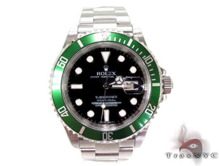 Rolex Submariner 16610 steel watch with black dial and green bezel, stainless steel bracelet.
