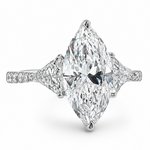 Marquise-cut lab-grown diamond three-stone engagement ring with trillion side stones and pavé diamond band.