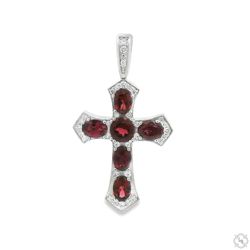 Sterling silver cross pendant with deep red oval gemstones and decorative accents