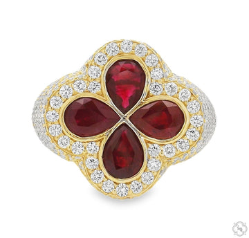 Yellow gold ring with clover-shaped ruby gemstones and surrounding diamonds.