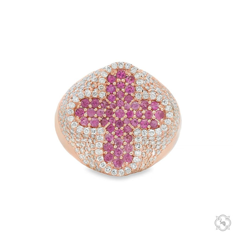 Rose gold ring with pink sapphire cross and surrounding white diamonds