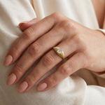 bezel set Diamond pinky signet ring in 14K gold featuring a 0.70 carat emerald-cut lab grown diamond