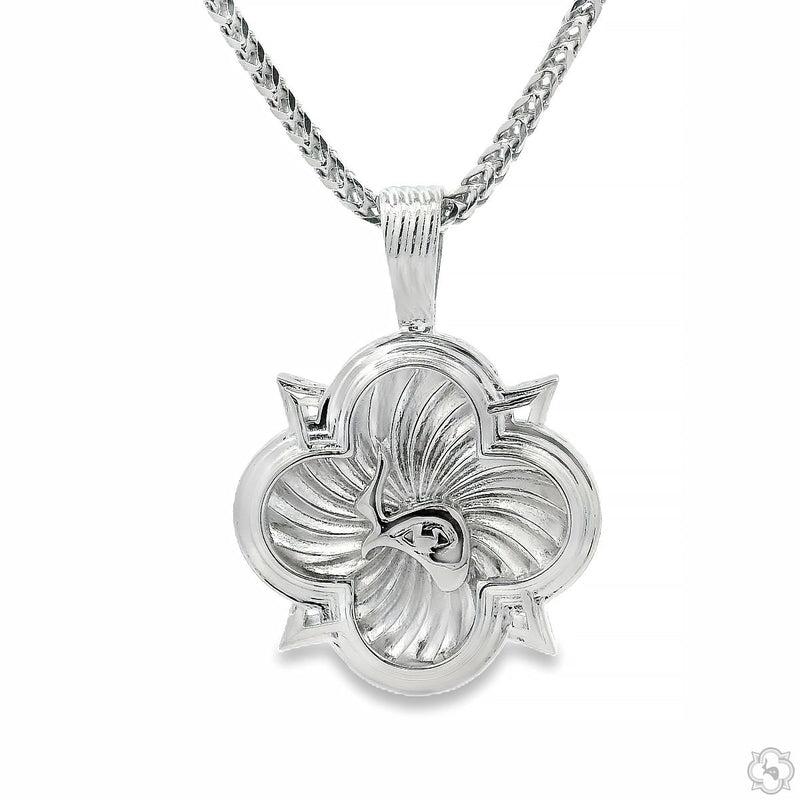 Silver Trax logo pendant with detailed fleur-de-lis design on Franco chain necklace