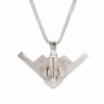 Silver B-2 bomber aircraft pendant with detailed wings on a silver chain necklace.