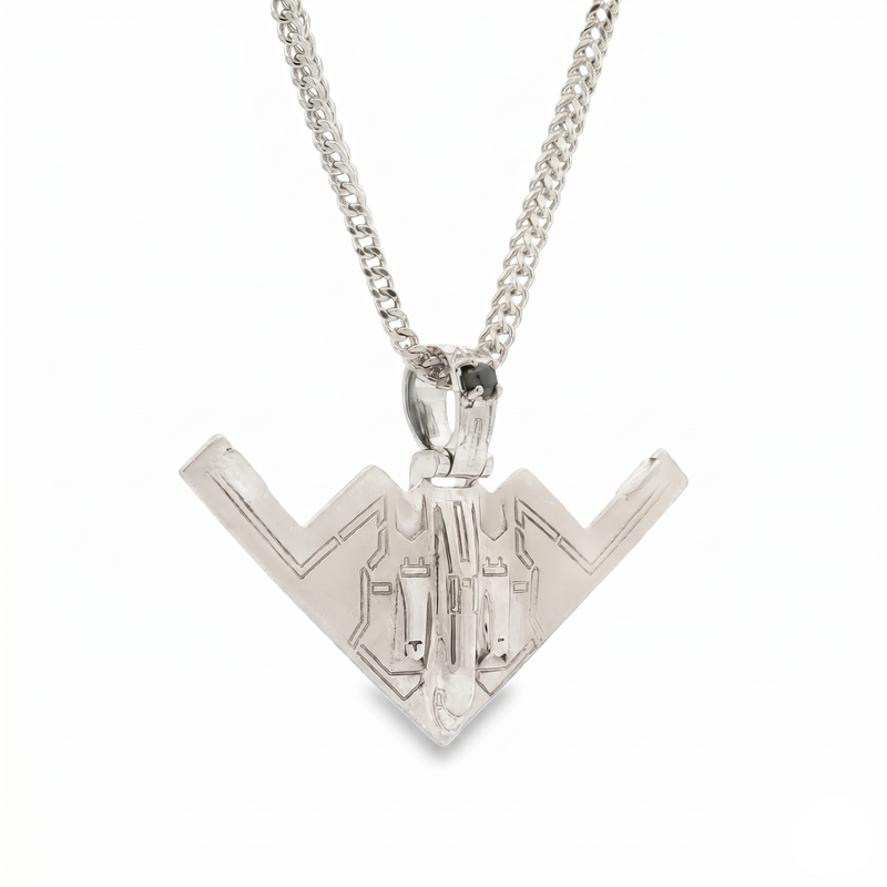 Silver B-2 bomber pendant with black diamond details on a matching silver chain.