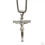 Silver Jesus crucifix pendant with detailed Franco chain necklace.