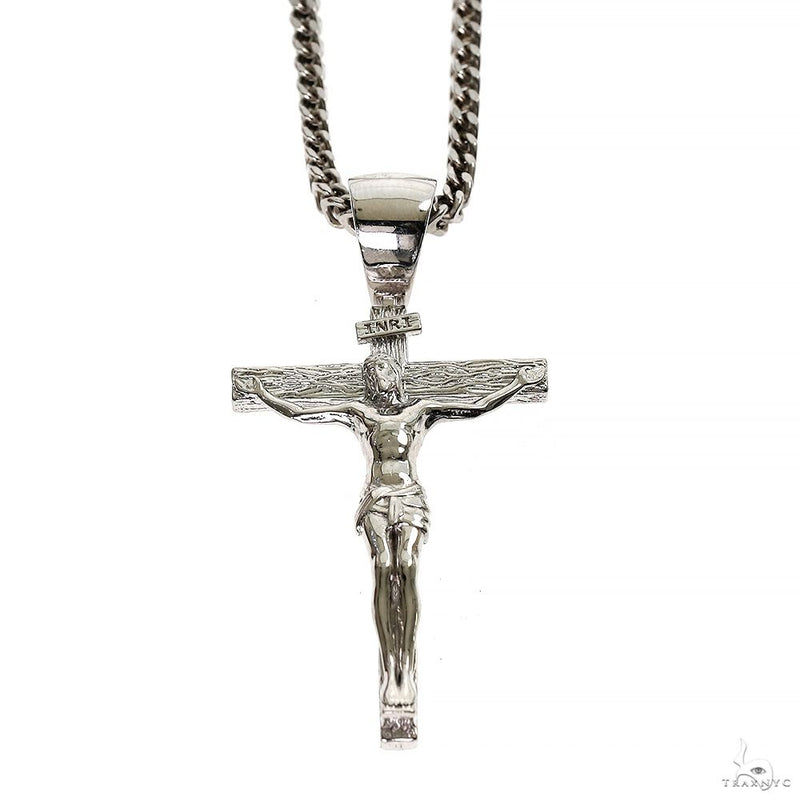 Silver Jesus crucifix pendant with detailed Franco chain necklace.