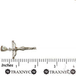 Silver Jesus crucifix pendant with detailed Franco chain necklace.
