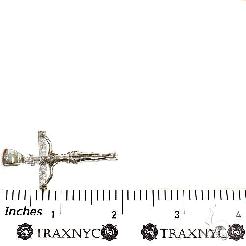 Silver Jesus crucifix pendant with detailed Franco chain necklace.