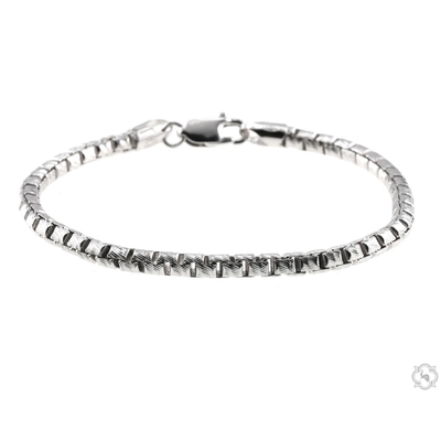 Silver bracelet on a white background