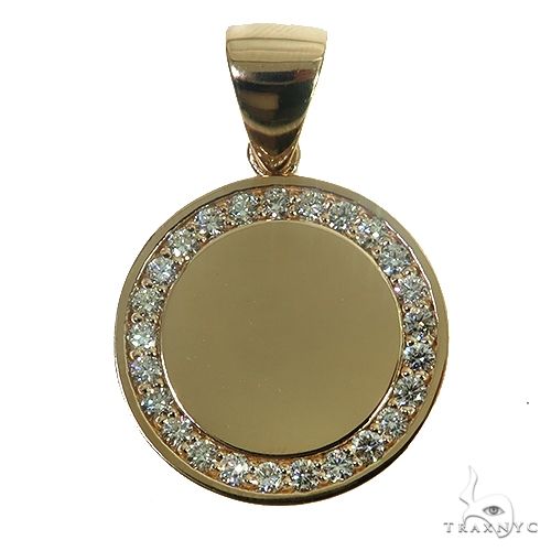 Small round yellow gold pendant with diamond halo and smooth center plate