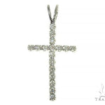 White gold small round-cut diamond cross pendant with delicate prong setting.