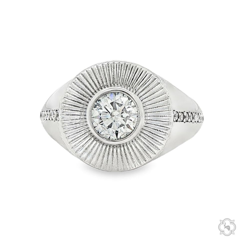 Silver men's ring with central diamond and textured sunburst design around it