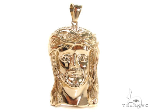 Solid 10K gold Jesus face pendant, front view showing high-relief portrait detail