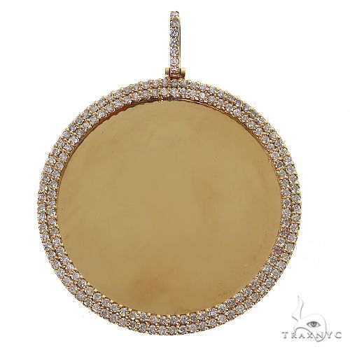 Round yellow gold photo pendant with two diamond rows around the edge and diamond bail