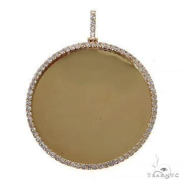 Round yellow gold pendant with diamond halo and diamond-accented bail.
