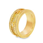 Yellow gold men's spinner ring with diamond accents and intricate textured design.