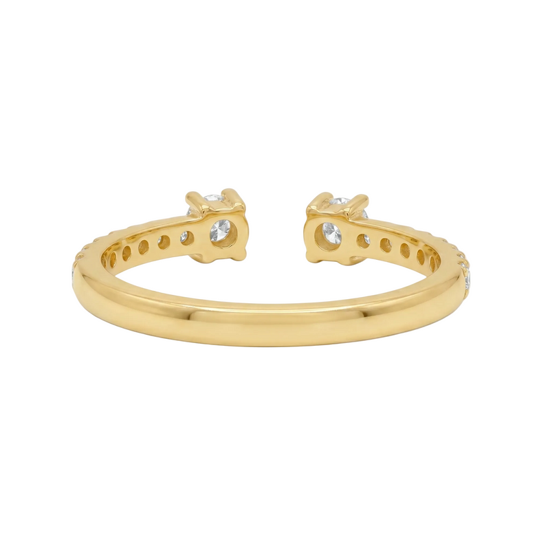 Gold open ring with small diamonds along band and at open ends.