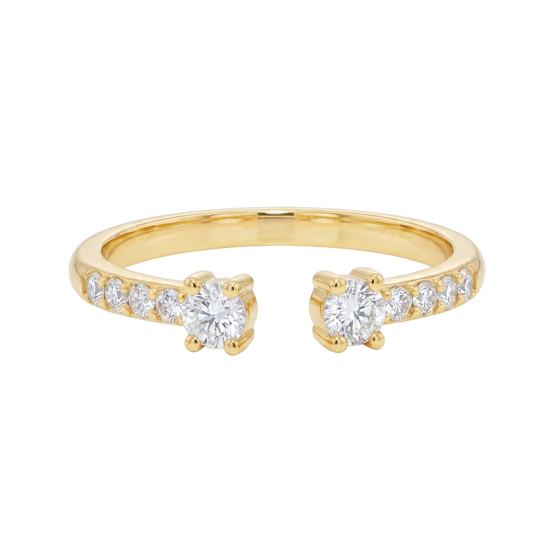 Yellow gold open ring with two central diamonds and smaller diamonds along the band.