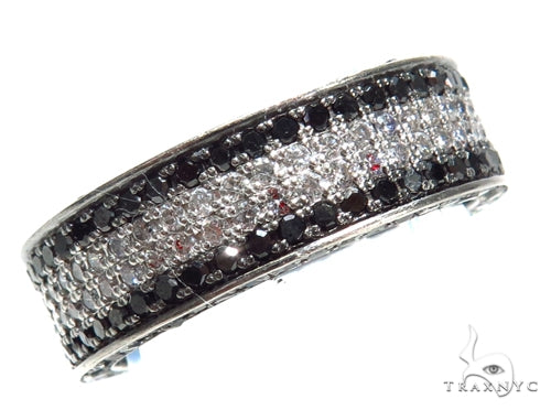 mens black diamond ring with round-cut prong-set stones, top-down view showing high-contrast stone layout