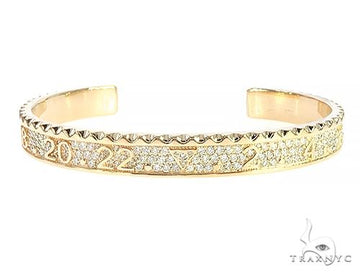 Dive bezel diamond bracelet in 14k yellow gold – front view of bezel-set round-cut diamond row