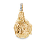 Yellow gold Sacred Heart Jesus pendant with diamond-accented bail.