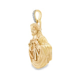 Yellow gold Sacred Heart Jesus pendant with diamond-accented bail.