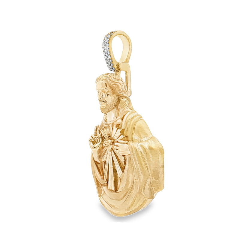 Yellow gold Sacred Heart Jesus pendant with diamond-accented bail.