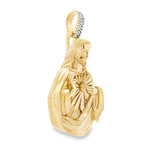 Yellow gold Sacred Heart Jesus pendant with diamond-accented bail.