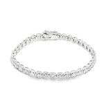 White gold bezel set tennis bracelet with round diamonds and secure clasp.