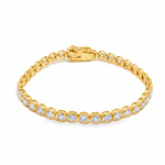 White gold bezel set tennis bracelet with round diamonds and secure clasp.