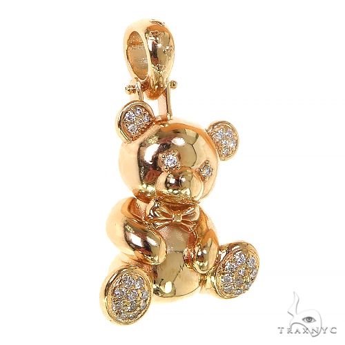 Yellow gold teddy bear pendant with diamond accents on ears, paws, and nose
