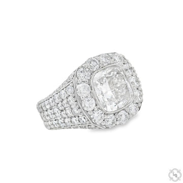 White gold men's ring with large square diamond surrounded by multiple smaller diamonds.