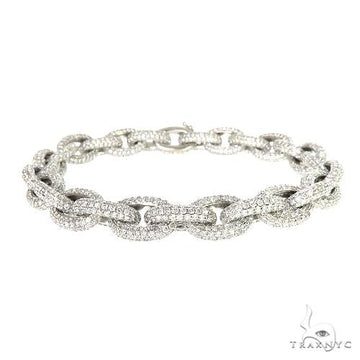Diamond bracelet with full pavé or channel-set stones across the band – front view on white background