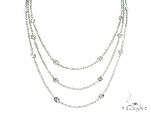 Three-layer necklace with bezel-set diamonds totaling 3.90 carats