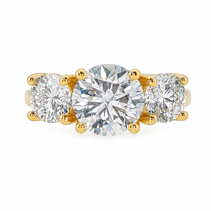 Sophia round three stone lab grown diamond engagement ring in 14K yellow gold with a 2 carat round center diamond, two 0.70 carat round side stones, and a polished 2.00mm band.