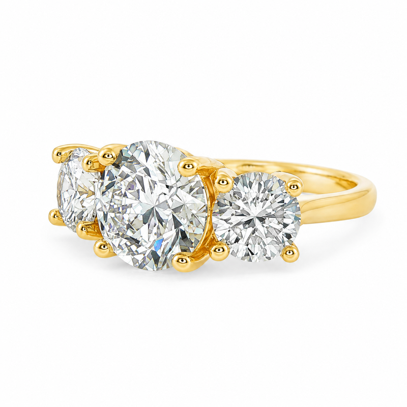 Sophia round three stone lab grown diamond engagement ring in 14K yellow gold with a 2 carat round center diamond, two 0.70 carat round side stones, and a polished 2.00mm band.