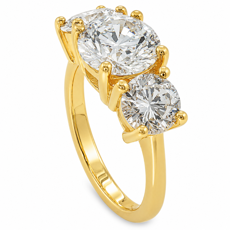 Sophia round three stone lab grown diamond engagement ring in 14K yellow gold with a 2 carat round center diamond, two 0.70 carat round side stones, and a polished 2.00mm band.