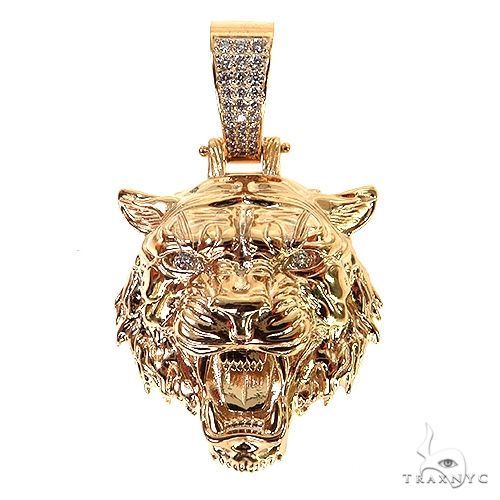 Large yellow gold tiger head pendant with detailed facial features and gemstone eyes