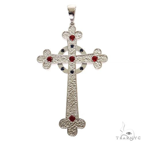 Sterling silver men's cross pendant with textured design and red gemstone accents