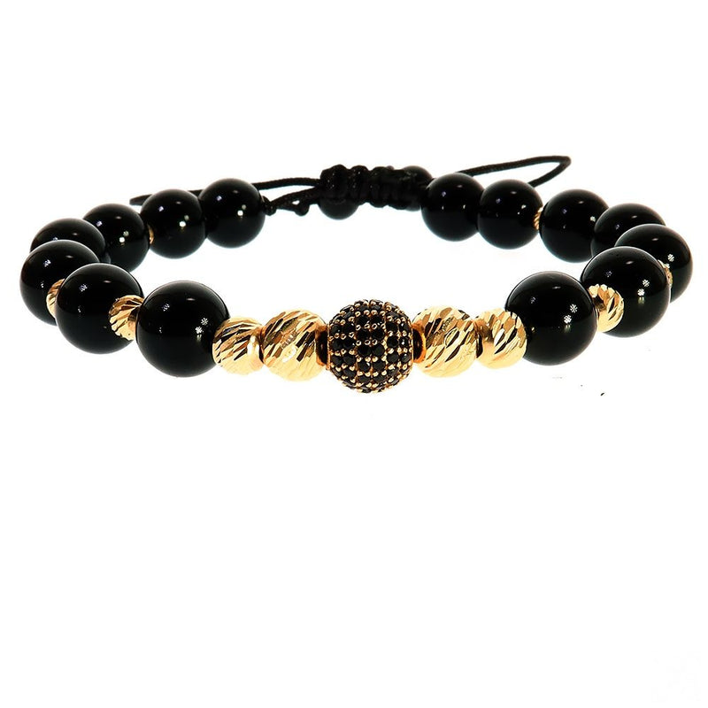 Black beaded men's bracelet with gold twisted beads and a central gold-studded bead