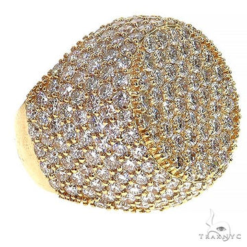 Yellow gold men's ring with dense cluster of small round diamonds.