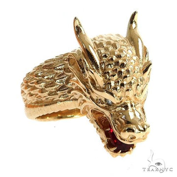 Yellow gold men's ring shaped like a detailed dragon head with textured scales and horns.