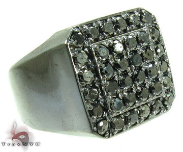 Silver men's ring with square black diamond cluster setting.