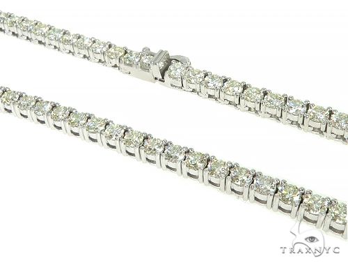14K white gold tennis chain with round diamonds, sleek and classic design