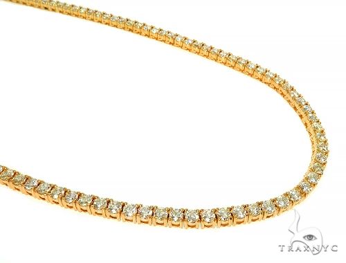 14K yellow gold diamond tennis chain – close-set round stones, flat link layout, full length view
