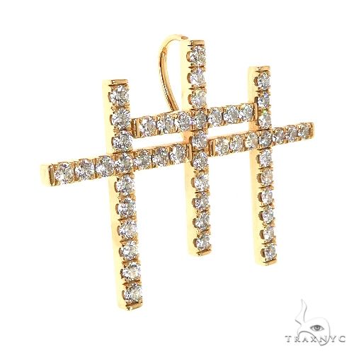 Yellow gold triple cross pendant encrusted with round diamonds, men's custom jewelry piece